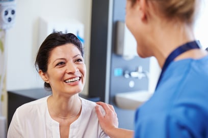 Woman receiving care by a doctor